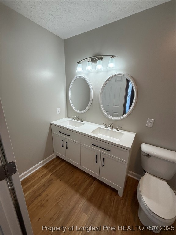 31 Buckboard Lane Autryville, NC 28318 - Photo 18 of 32 a bathroom with a toilet a sink and a mirror