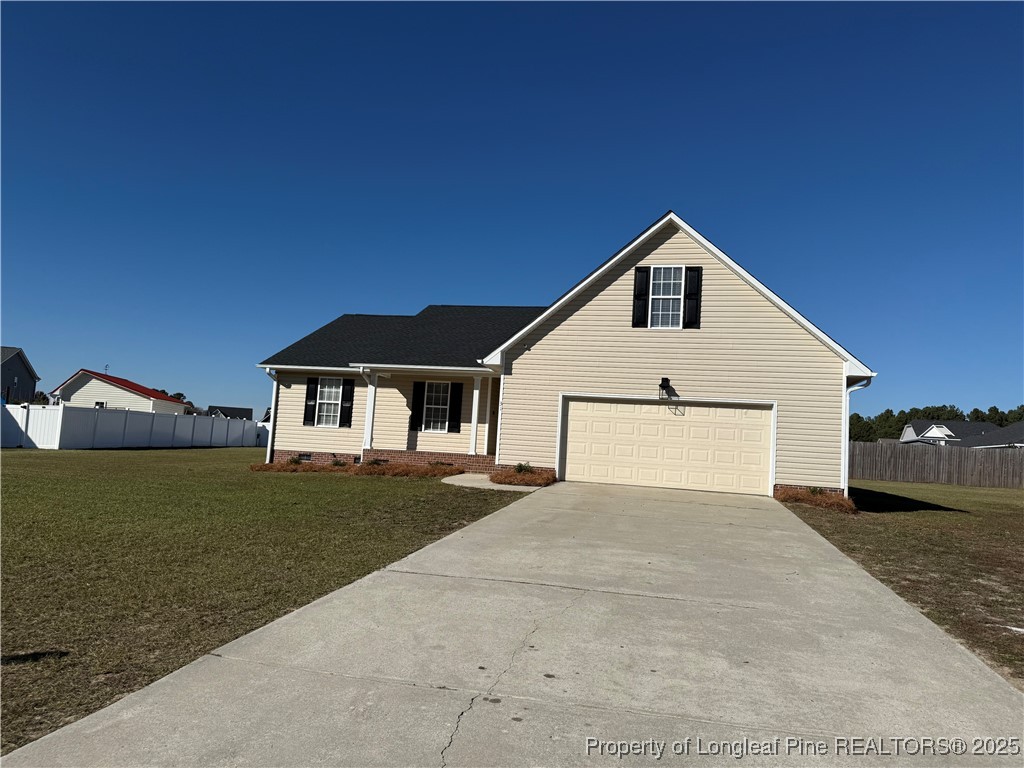 31 Buckboard Lane Autryville, NC 28318 - Photo 2 of 32 a view of a house with a yard