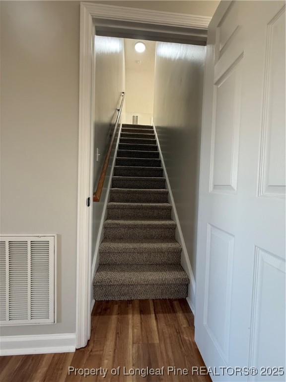 31 Buckboard Lane Autryville, NC 28318 - Photo 22 of 32 a view of entryway and hall with wooden floor