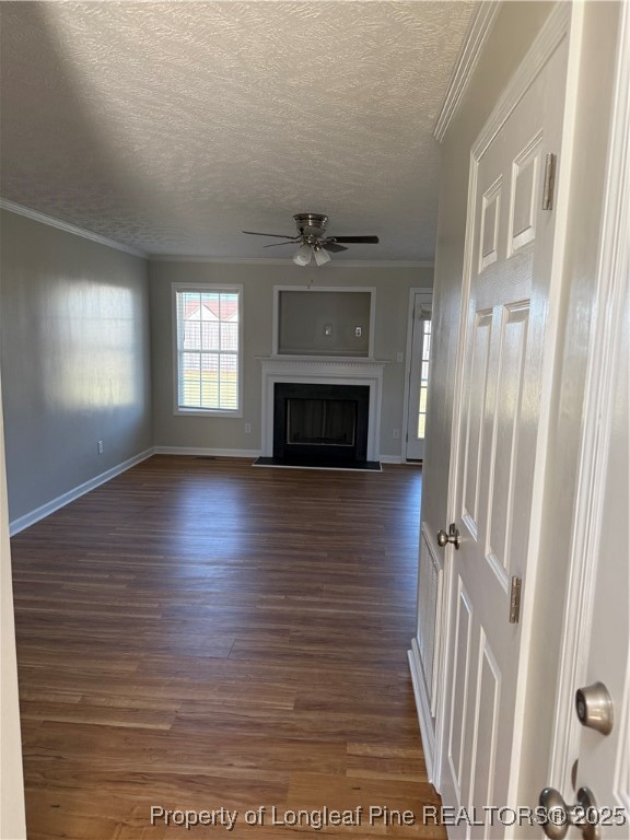 31 Buckboard Lane Autryville, NC 28318 - Photo 3 of 32 a view of an empty room with a fireplace and a window