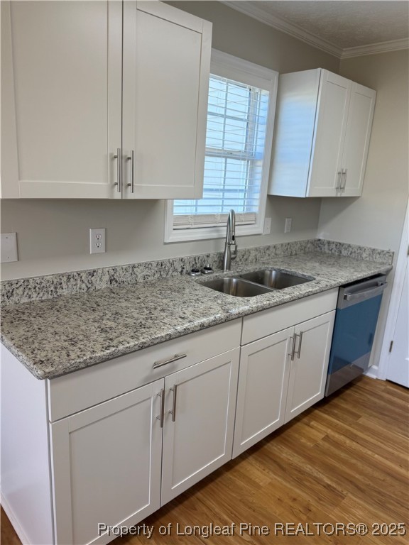 31 Buckboard Lane Autryville, NC 28318 - Photo 7 of 32 a kitchen with granite countertop white cabinets and a sink