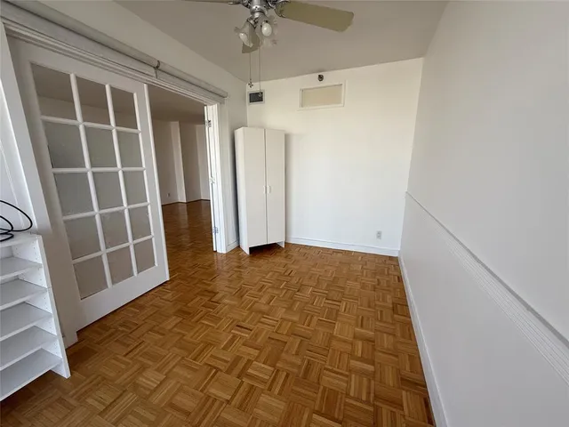 a view of balcony and dining room