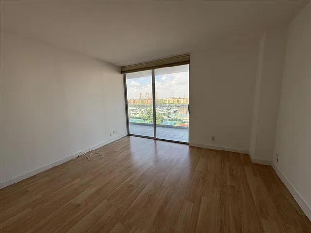 a spacious bathroom with a double vanity sink a mirror and a shower