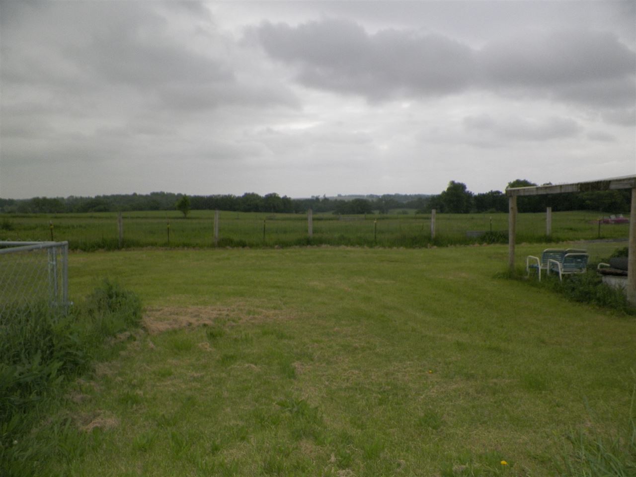 11483 North Tower Road Byron, IL 61010 - Photo 17 of 17 a view of a lake with houses in back