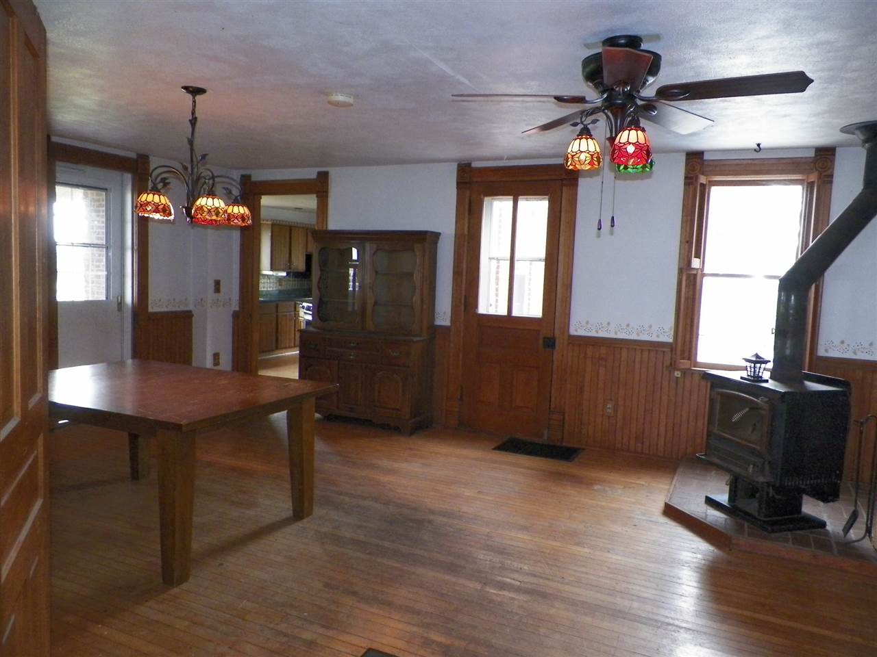 11483 North Tower Road Byron, IL 61010 - Photo 7 of 17 a view of a livingroom with furniture window and wooden floor