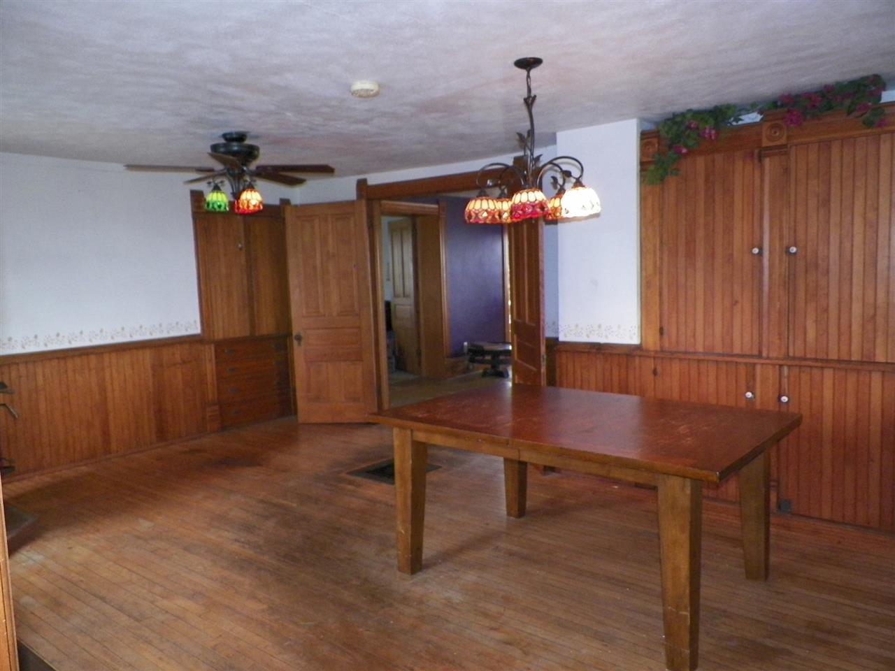 11483 North Tower Road Byron, IL 61010 - Photo 10 of 17 a view of a room with a table and chairs