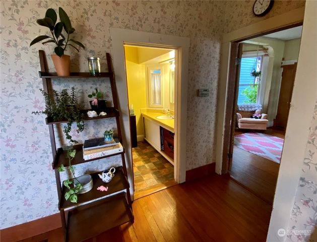a view of a dining room with furniture and window