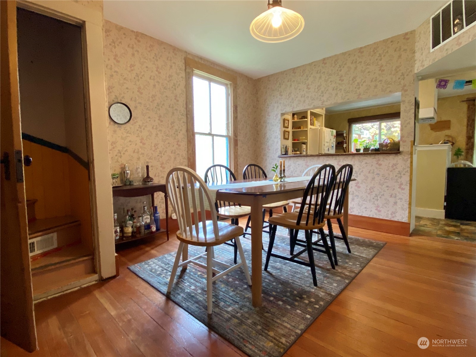 906 High Street Bellingham, WA 98225 - Photo 16 of 40 a view of a dining room with furniture and window