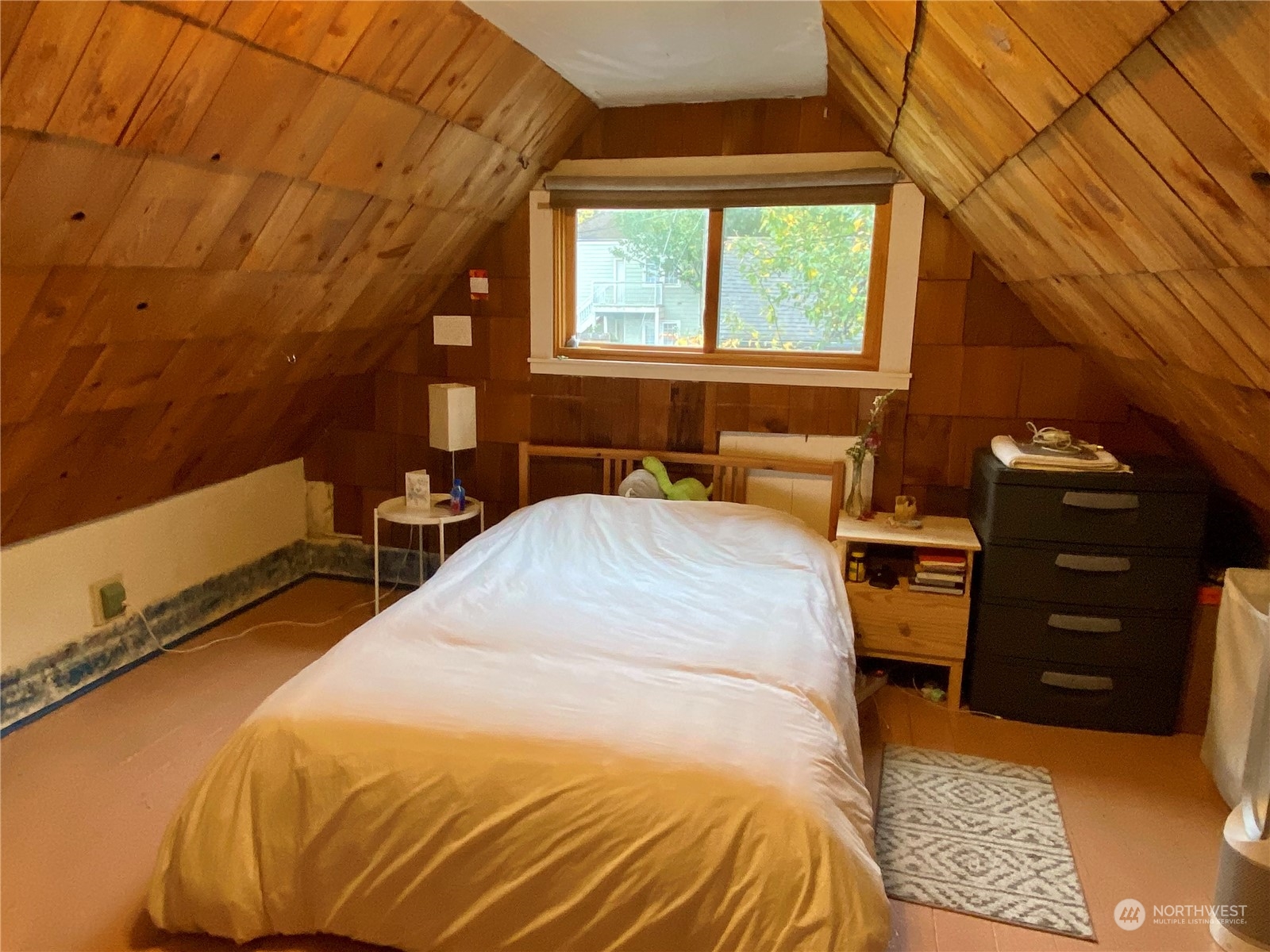 906 High Street Bellingham, WA 98225 - Photo 30 of 40 a bedroom with a bed and a dresser