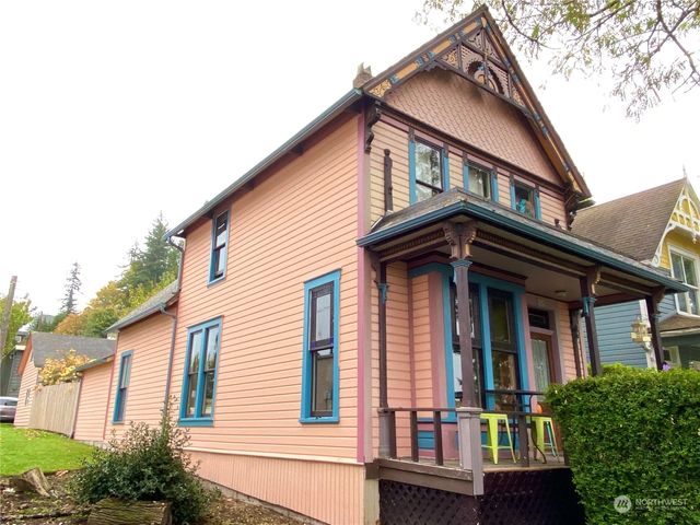 a view of outdoor space with garden and trees