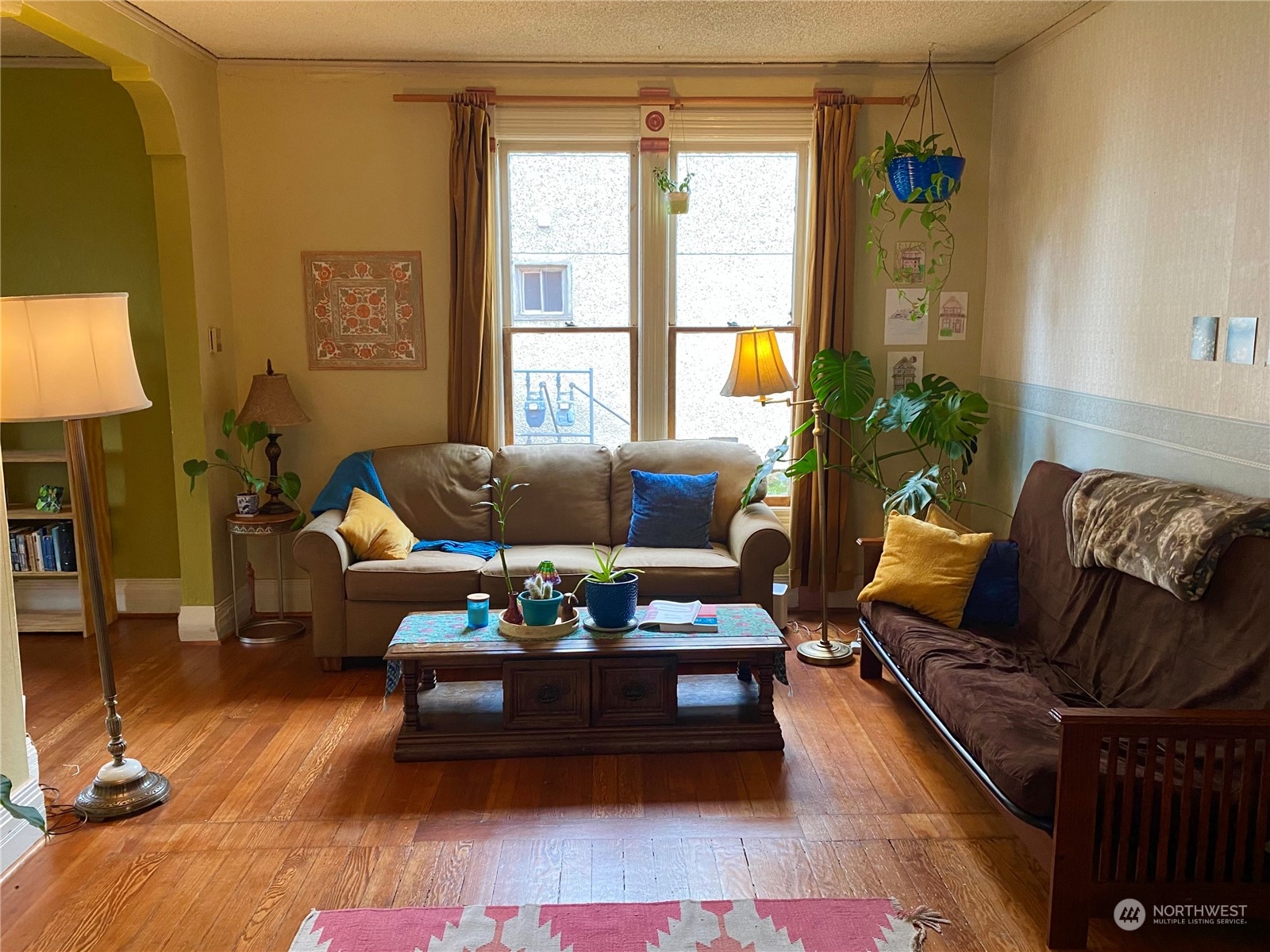 906 High Street Bellingham, WA 98225 - Photo 7 of 40 a living room with furniture potted plant and a window