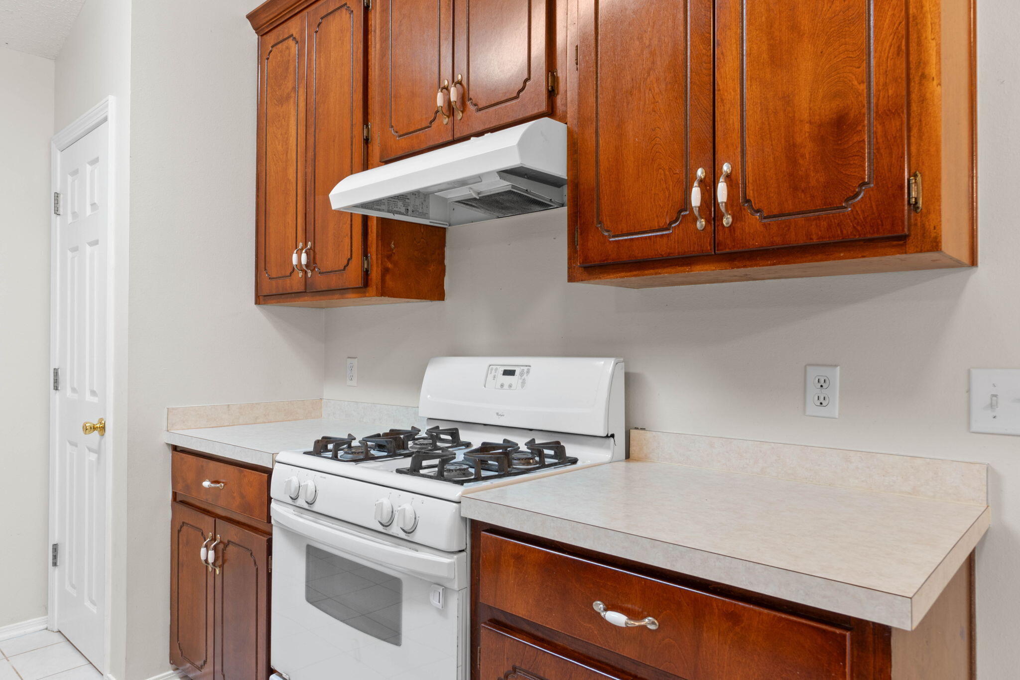 4591 Scarlet Drive Crestview, FL 32539 - Photo 14 of 37 a kitchen with stainless steel appliances a stove and a microwave