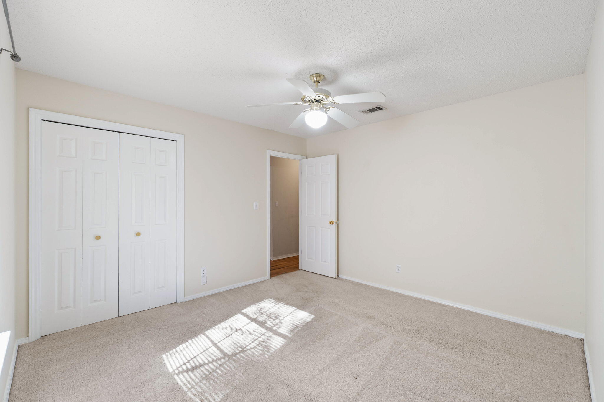 4591 Scarlet Drive Crestview, FL 32539 - Photo 19 of 37 a view of a big room with chandelier fan