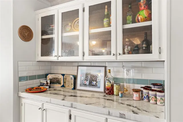 a kitchen with a cabinets and a window