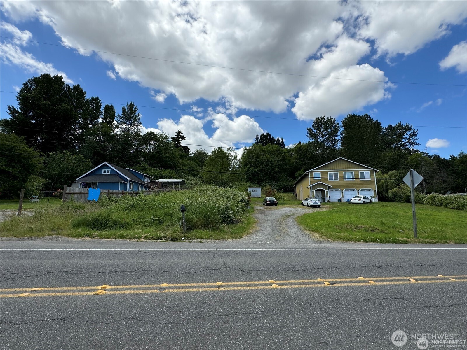 14253 Macadam Road South Tukwila, WA 98168 - Photo 13 of 15 a front view of a house with a garden