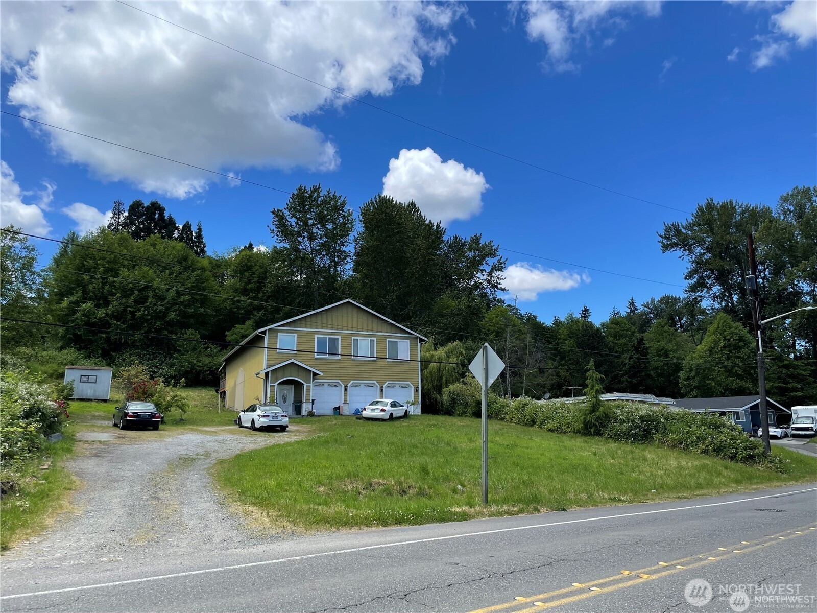 14253 Macadam Road South Tukwila, WA 98168 - Photo 2 of 15 a front view of a house with garden