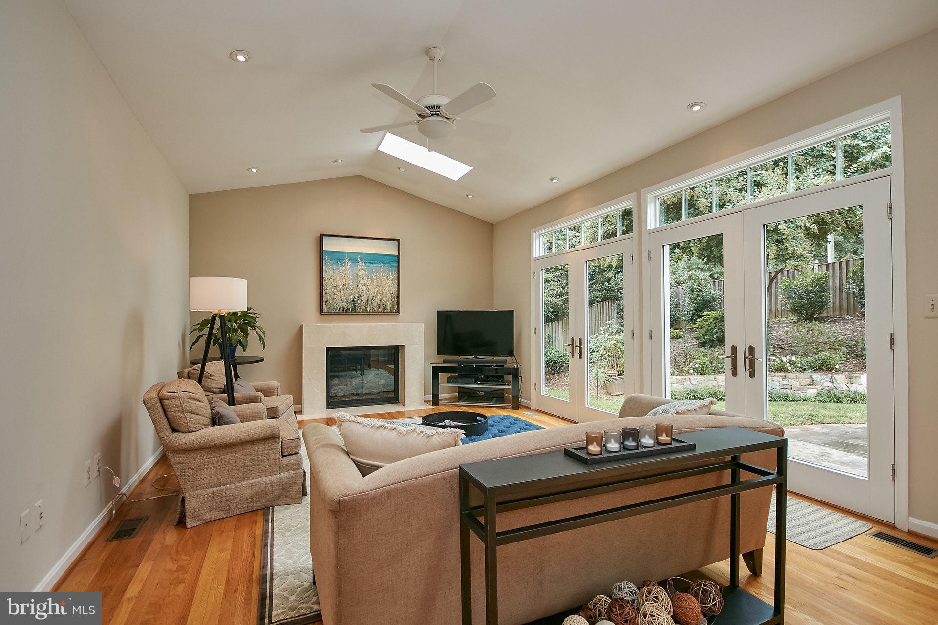6314 Hunting Ridge Lane McLean, VA 22101 - Photo 14 of 35 Family Room with Skylights and Gas Fireplace