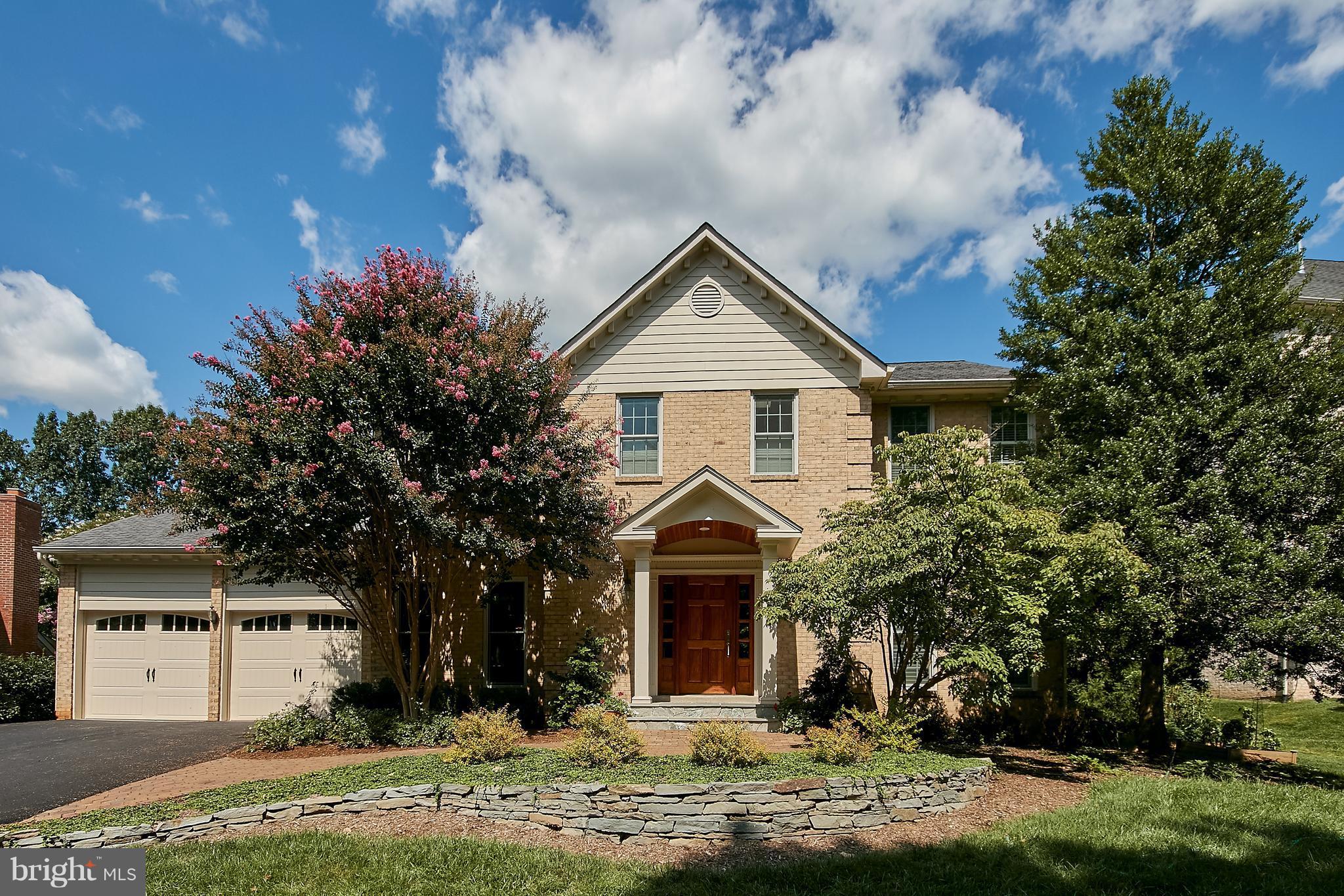 Brick Exterior with New Garage Doors
