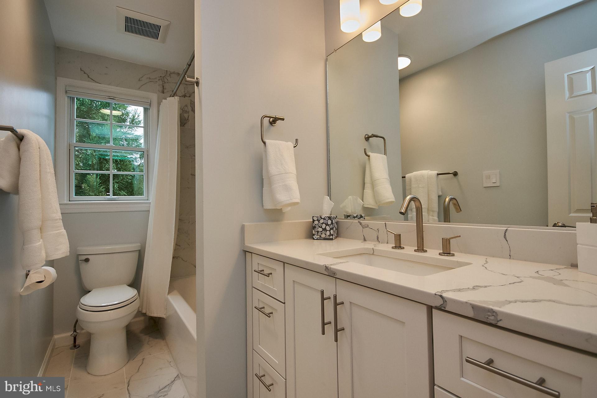 6314 Hunting Ridge Lane McLean, VA 22101 - Photo 25 of 35 Hall Bath with Quartz countertop
