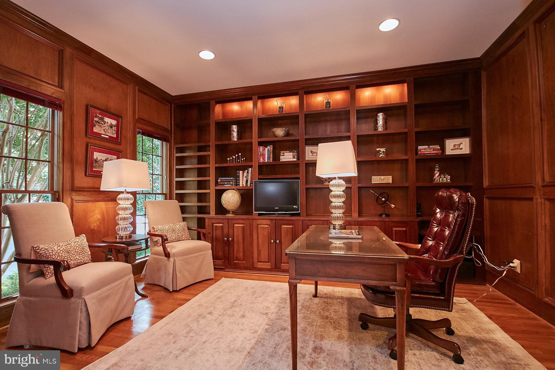 Home Office with Wood Paneling and Built-ins