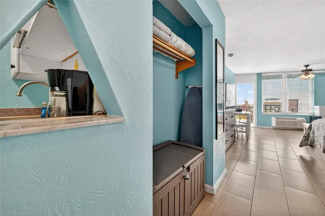 a view of living room with furniture and fireplace