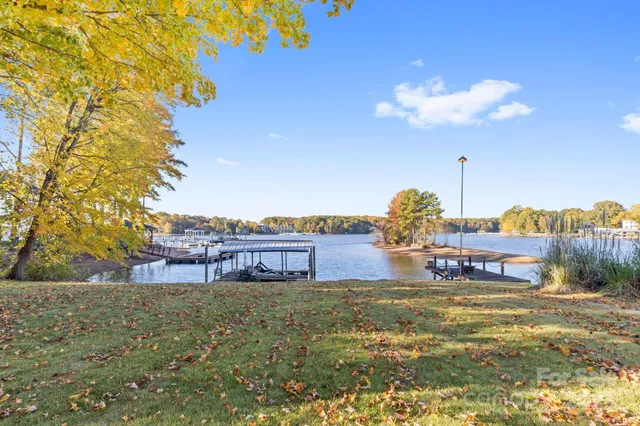 a view of a lake with a building in the background