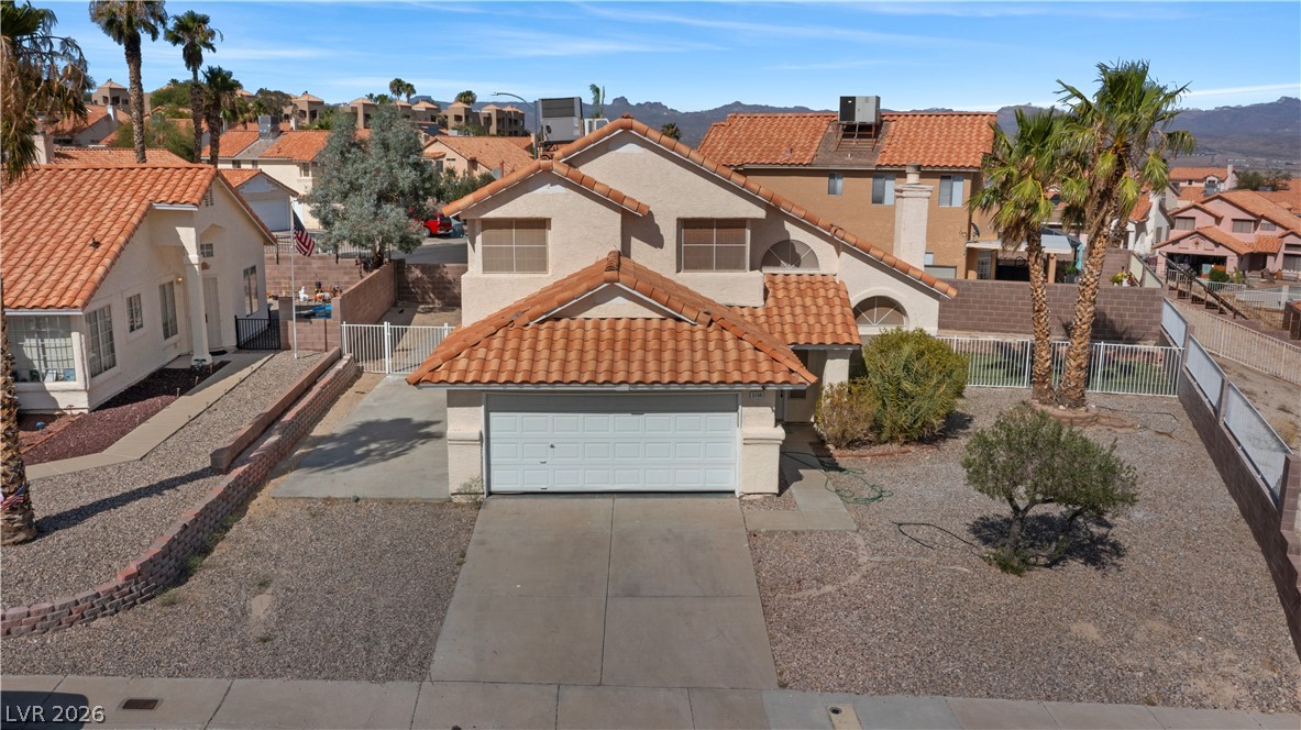 3156 Terrace View Drive Laughlin, NV 89029 - Photo 77 of 94 A terracotta-roofed residence presents a desert-friendly front yard and integrated garage.