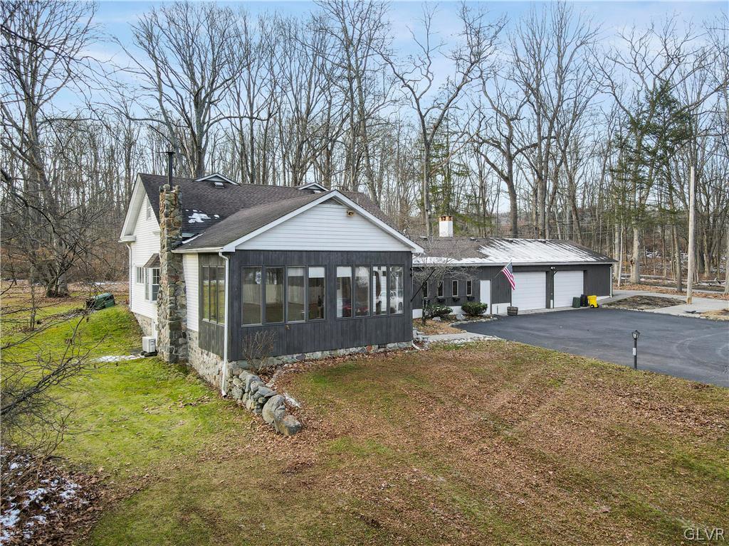 1133 Turkey Ridge Road Mount Bethel, PA 18343 - Photo 6 of 45 a front view of a house with a yard