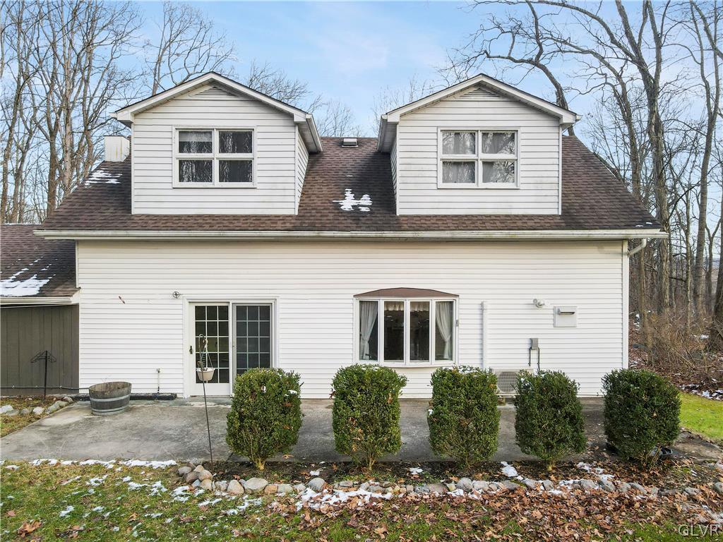 1133 Turkey Ridge Road Mount Bethel, PA 18343 - Photo 8 of 45 a front view of a house with garden