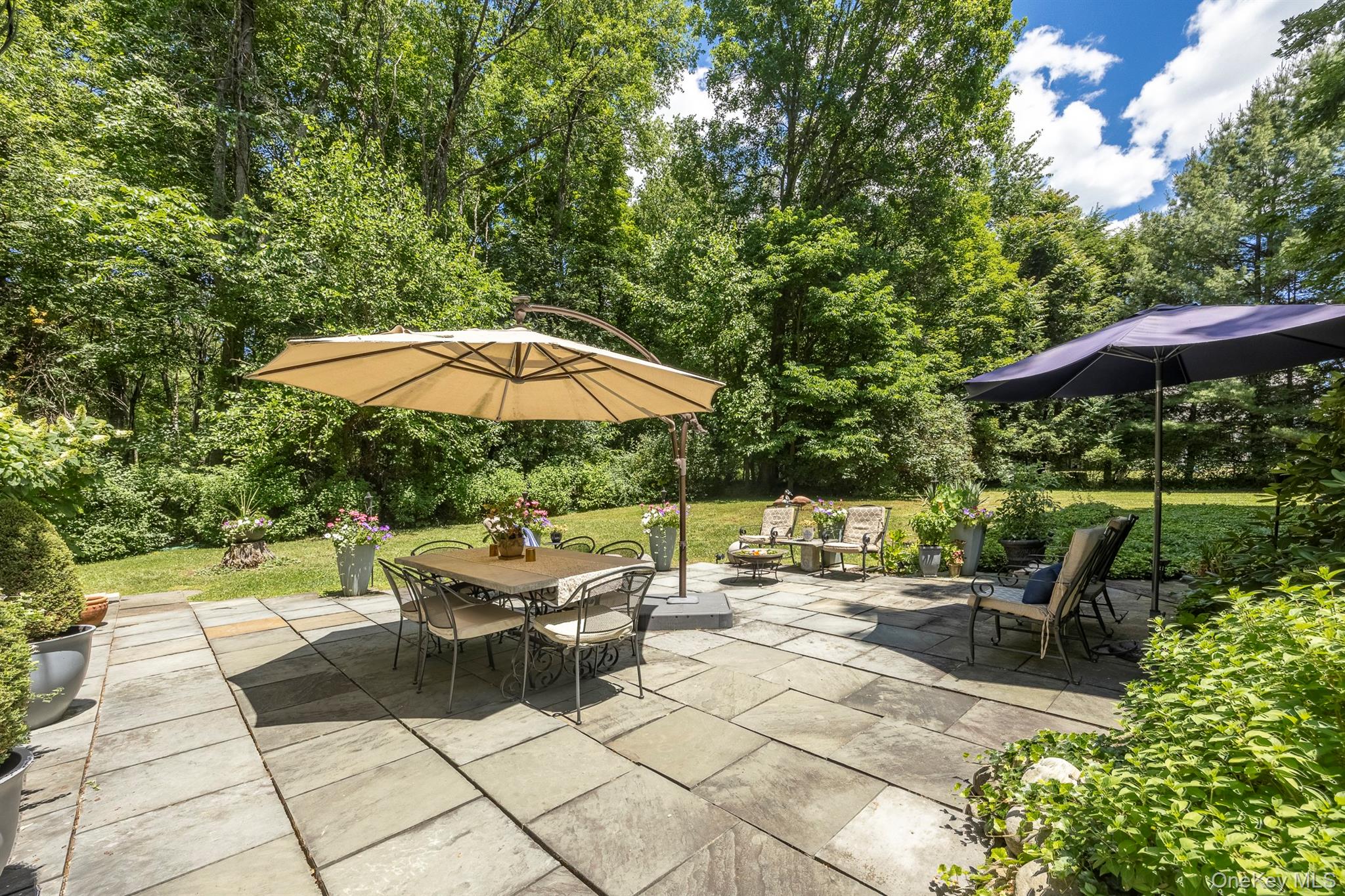 183 Titusville Road Poughkeepsie, NY 12603 - Photo 9 of 27 Sit on the beautiful patio and enjoy the view of the spacious backyard