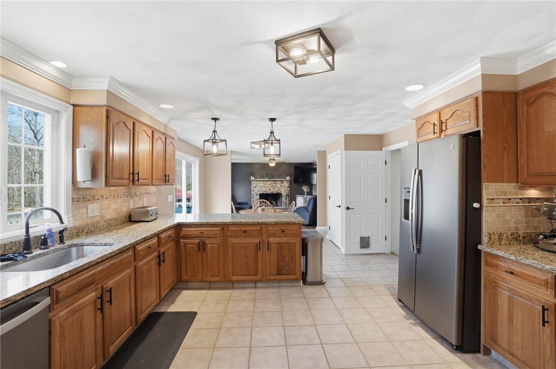 71 Rolling Hill Drive Exeter, RI 02822 - Photo 3 of 50 View through eat-in-kitchen, all the way into the living room.