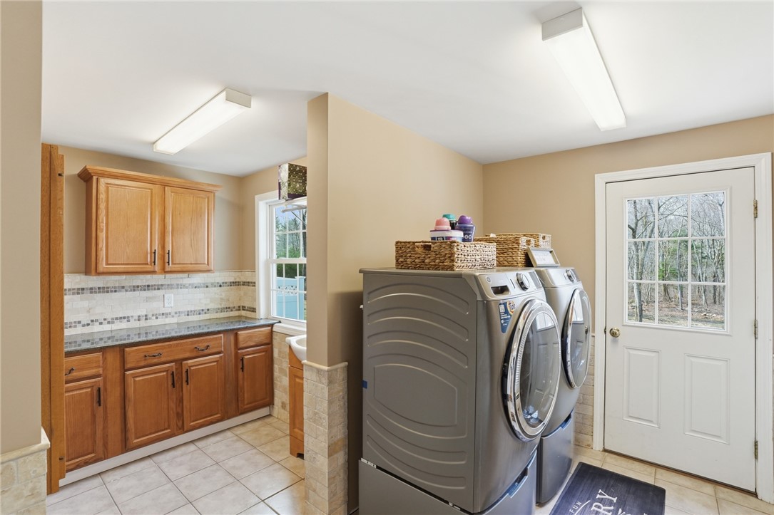 71 Rolling Hill Drive Exeter, RI 02822 - Photo 31 of 50 Laundry/mud room. This room connects the main house, the garage, the back deck, and the in-law.