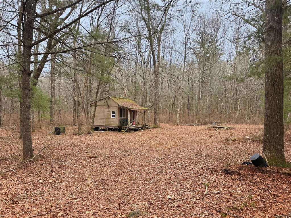 71 Rolling Hill Drive Exeter, RI 02822 - Photo 49 of 50 Hunting or she-shed. Trails continue into the forest, where they connect with 146 acres of land owned by the Nature Conservancy.