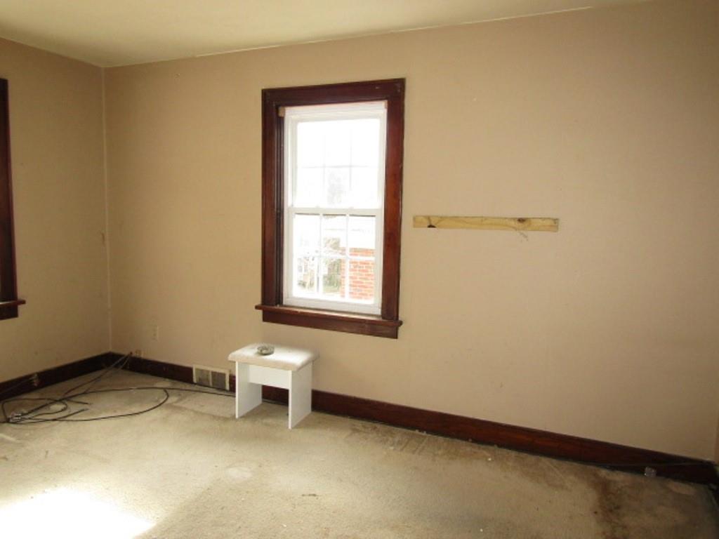 3825 Atkins Street Pittsburgh, PA 15212 - Photo 18 of 28 a bathroom with a sink a window and a toilet