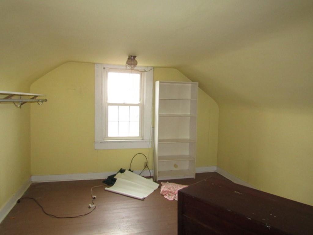 3825 Atkins Street Pittsburgh, PA 15212 - Photo 25 of 28 a bathroom with a sink and a mirror