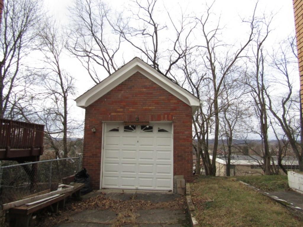 3825 Atkins Street Pittsburgh, PA 15212 - Photo 4 of 28 a front view of a house with a yard