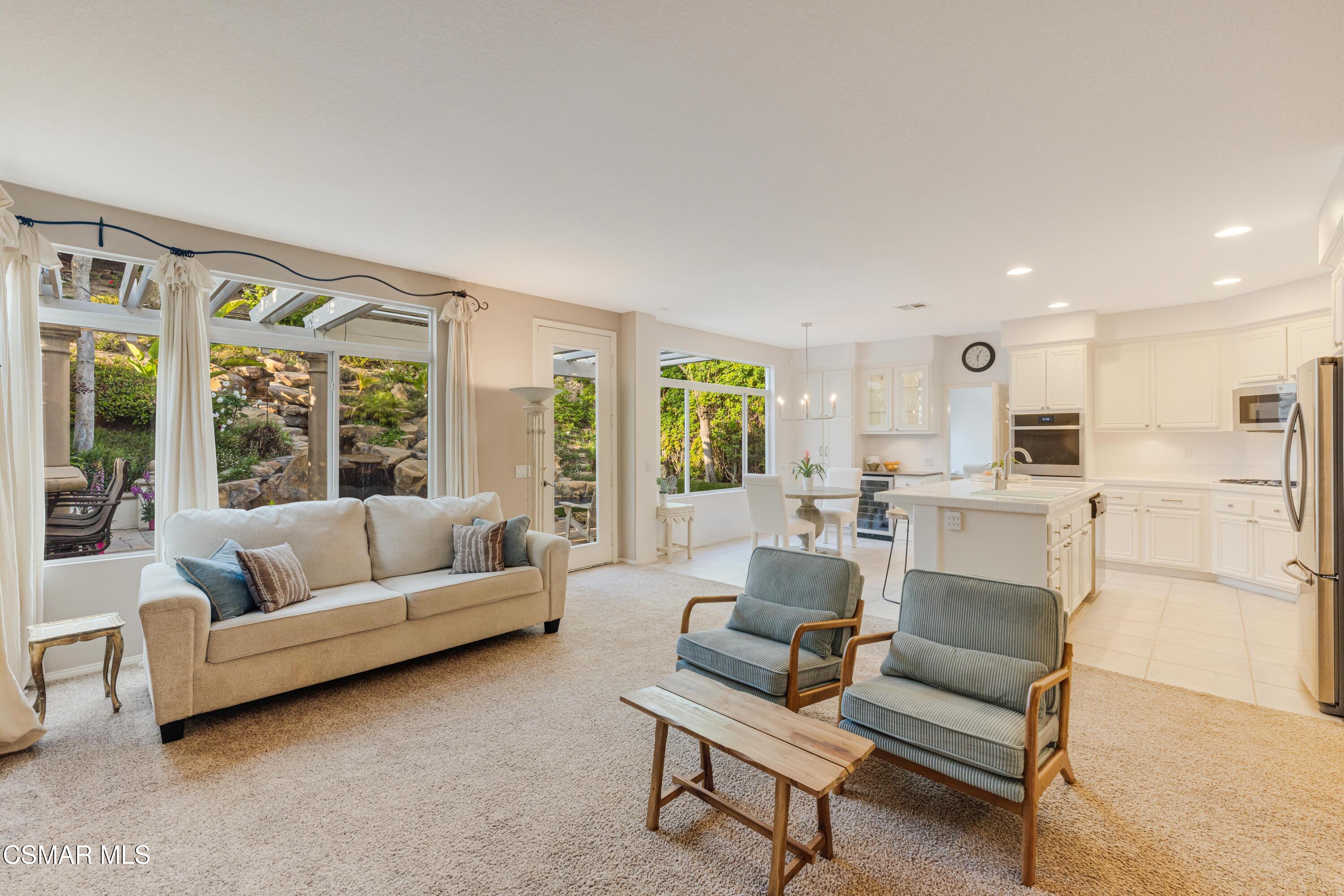 15633 Harte Lane Moorpark, CA 93021 - Photo 21 of 64 a living room with furniture and a large window