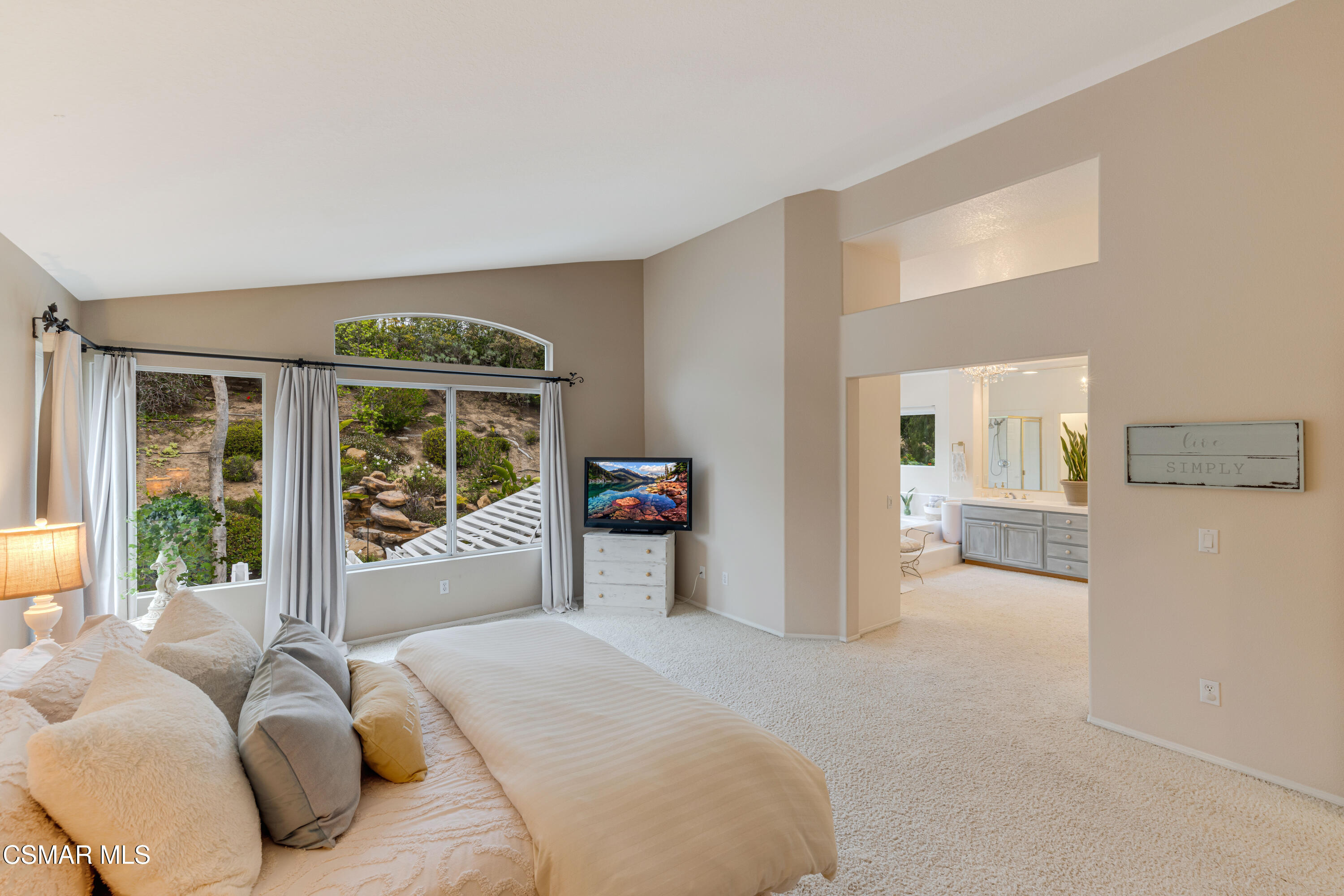 15633 Harte Lane Moorpark, CA 93021 - Photo 37 of 64 a bedroom with furniture and a large window