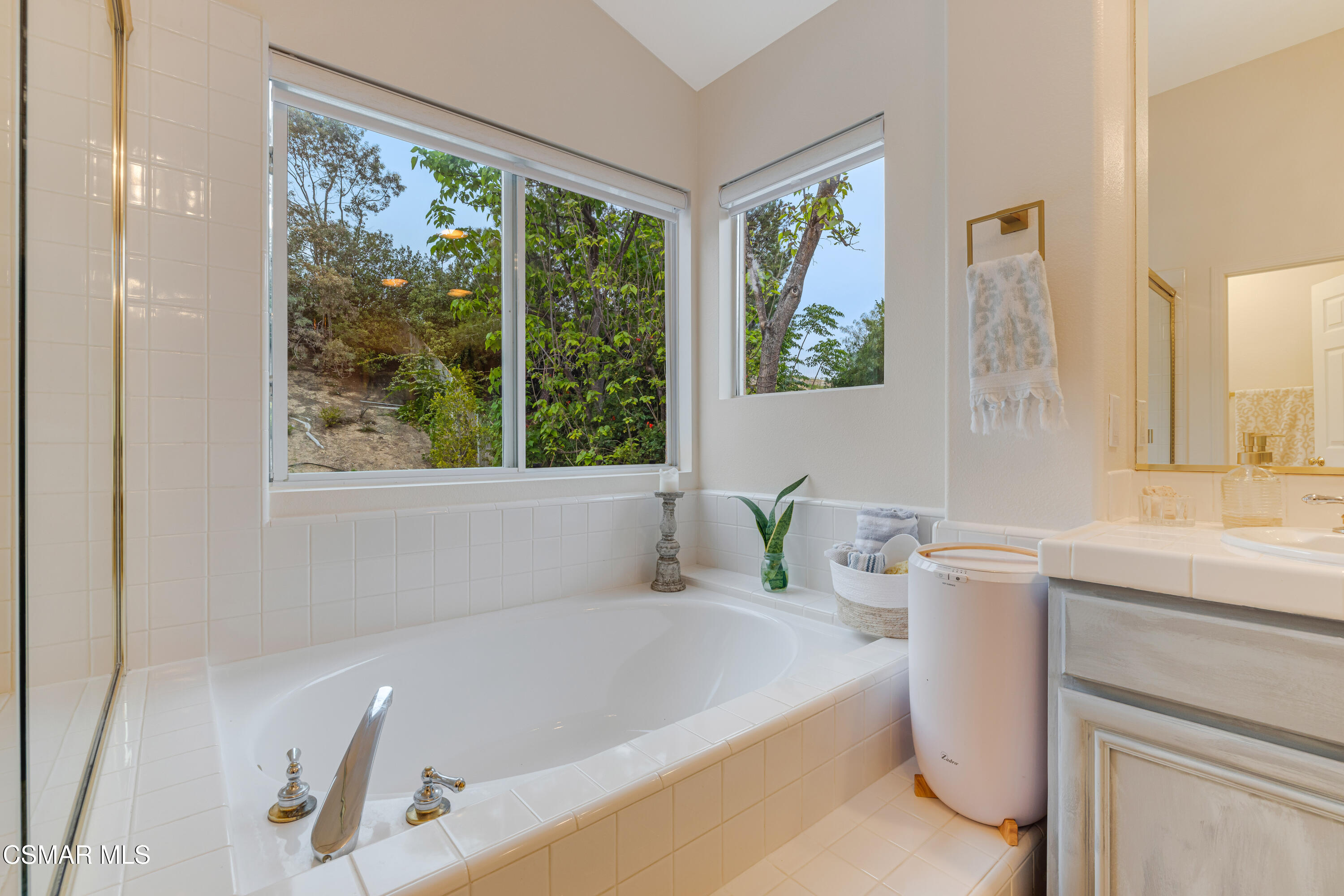 15633 Harte Lane Moorpark, CA 93021 - Photo 42 of 64 a bath tub sitting next to a window