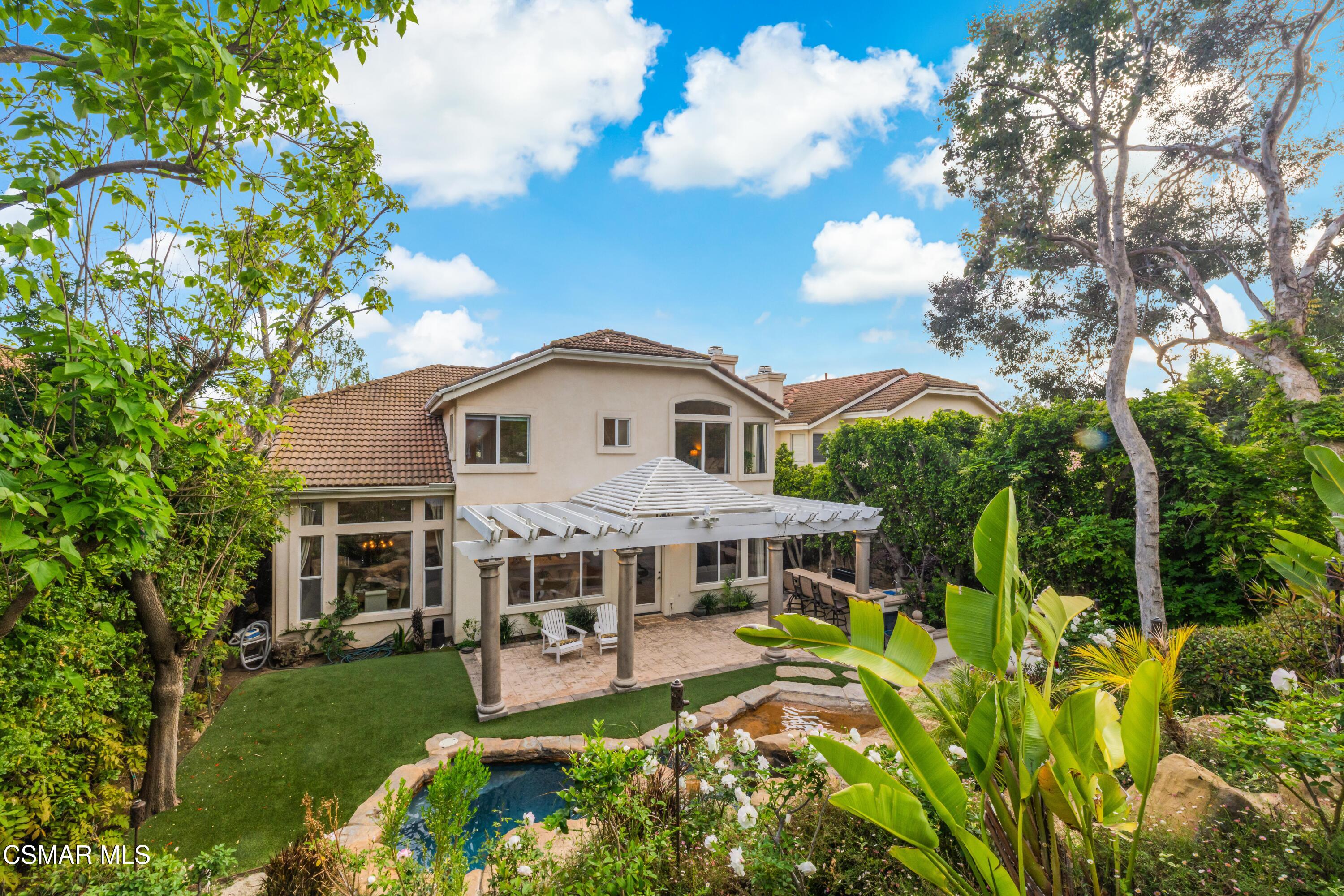 15633 Harte Lane Moorpark, CA 93021 - Photo 50 of 64 a view of a house with a big yard and large trees