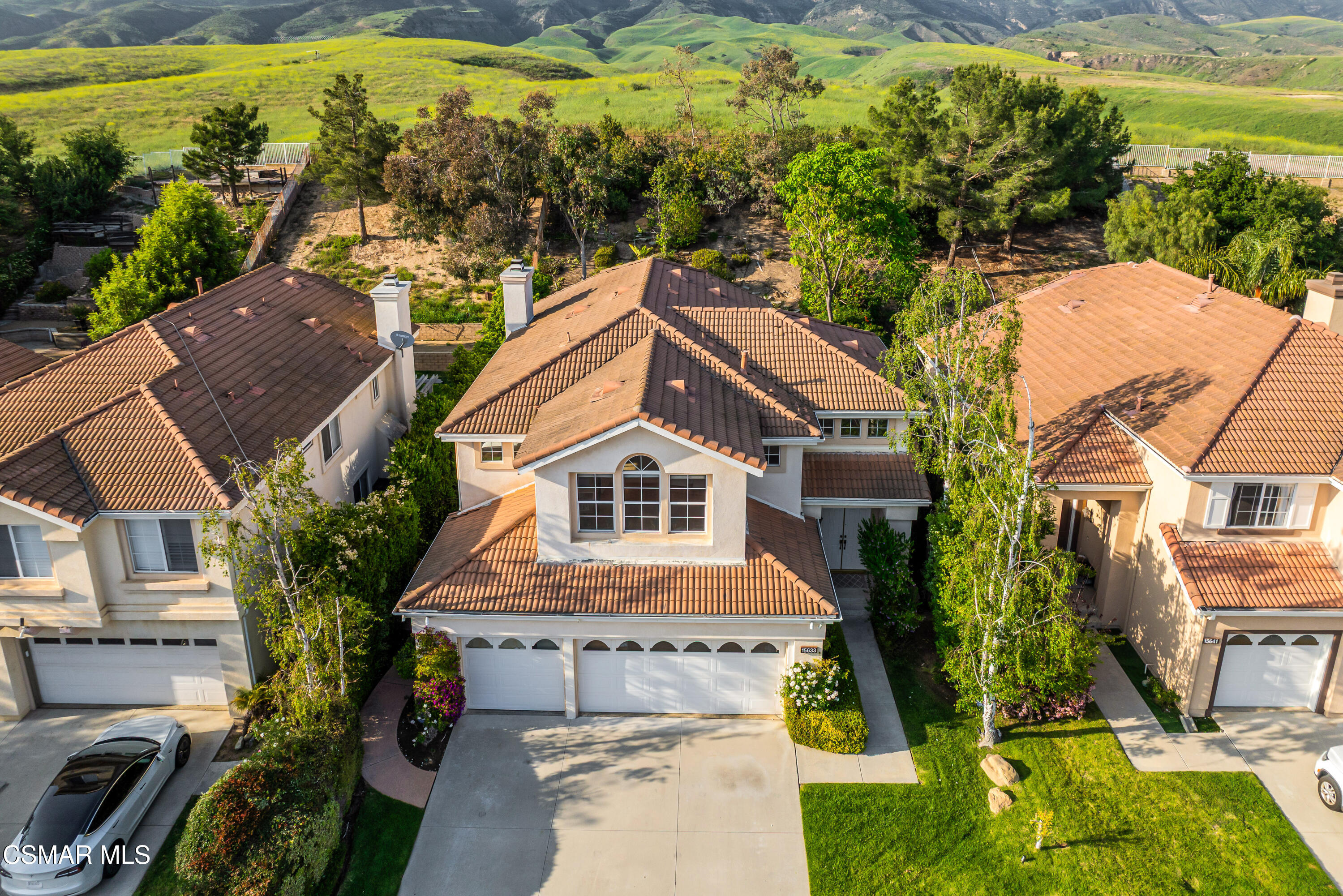 15633 Harte Lane Moorpark, CA 93021 - Photo 62 of 64 a aerial view of a house with a yard table and chairs