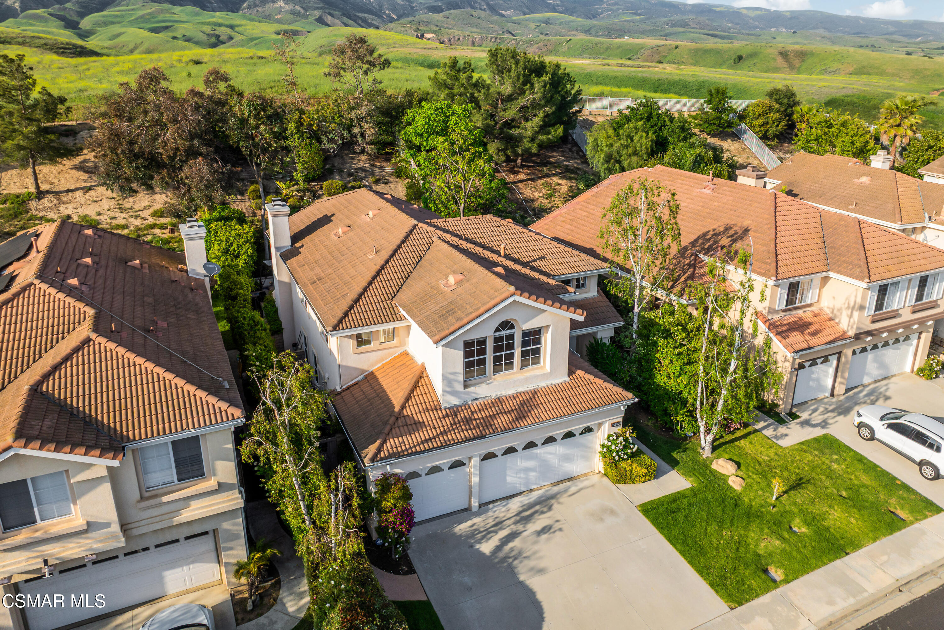 15633 Harte Lane Moorpark, CA 93021 - Photo 63 of 64 an aerial view of residential houses with outdoor space and trees
