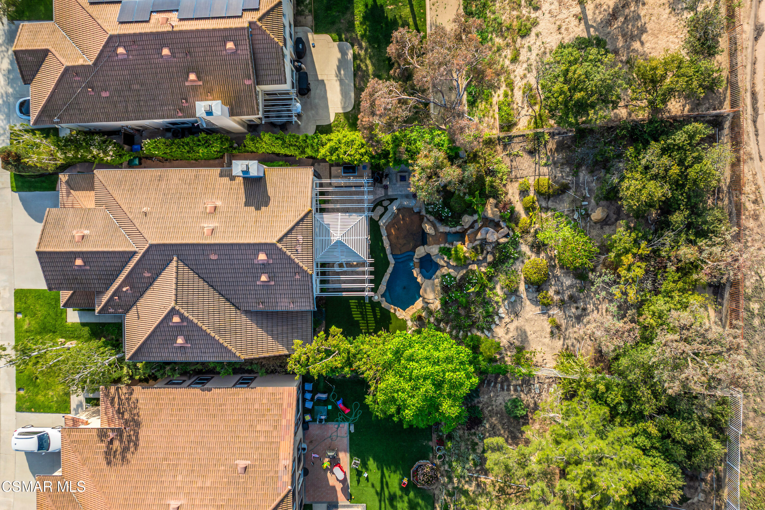 15633 Harte Lane Moorpark, CA 93021 - Photo 64 of 64 an aerial view of house with yard and mountain view in back
