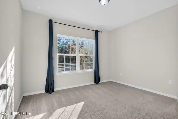 an empty room with a window