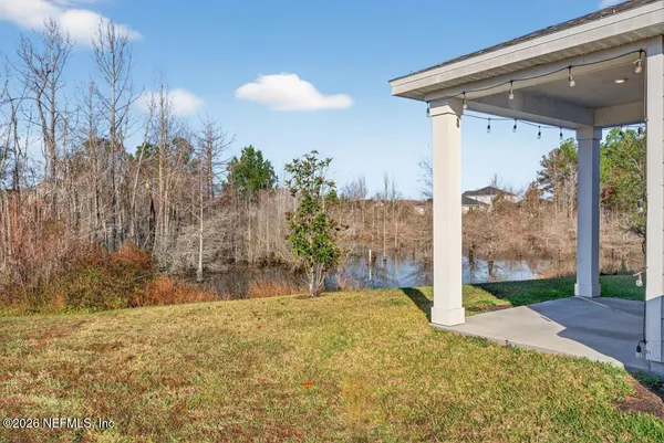 a view of backyard of the house