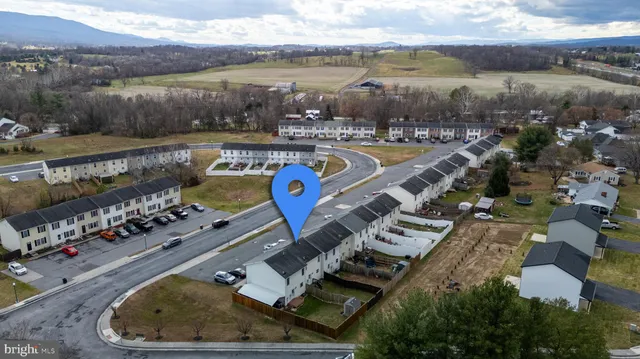 a view of a lake with a yard