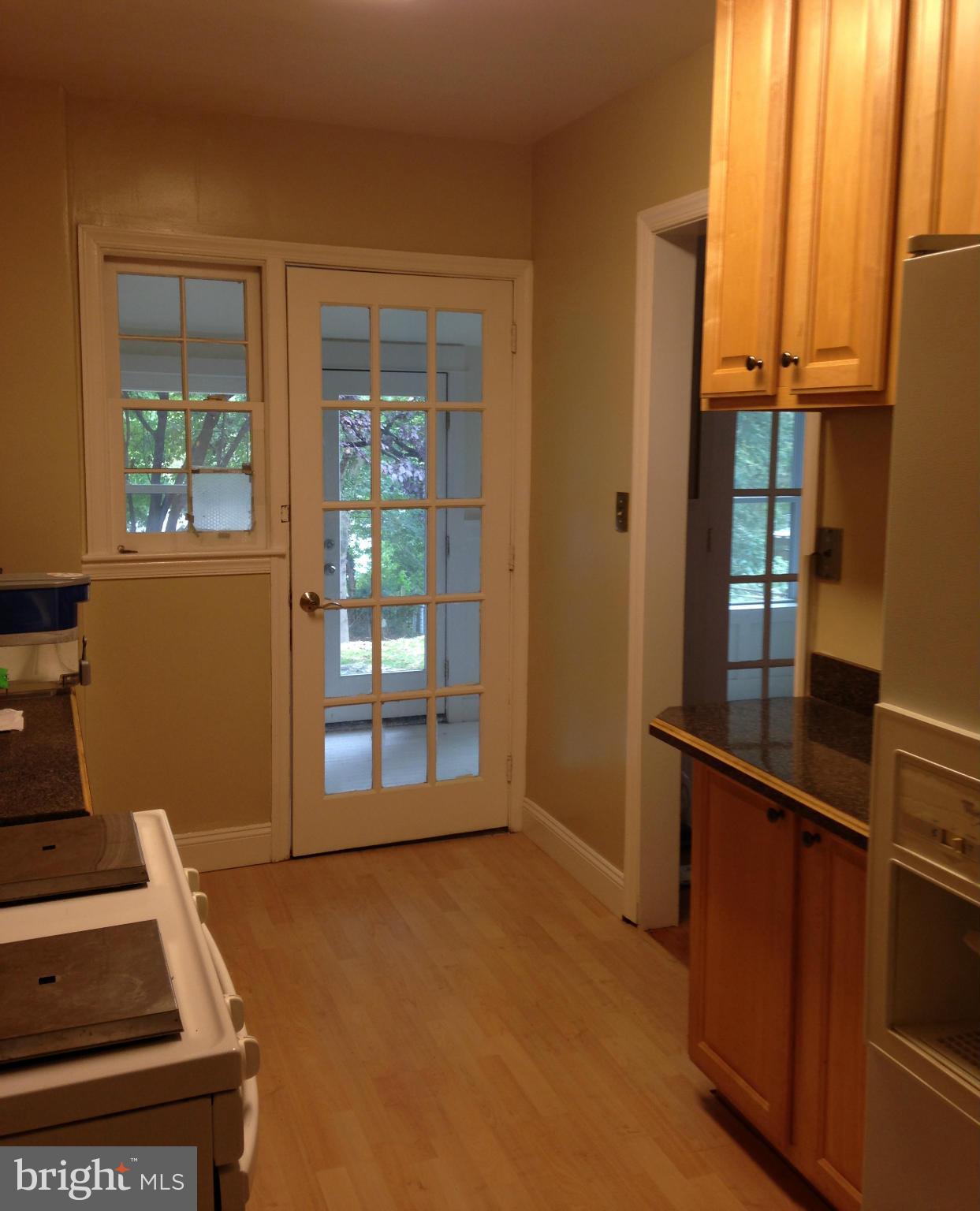 11937 Andrew Street Silver Spring, MD 20902 - Photo 10 of 25 View From Kitchen Thru Family Room to Yard