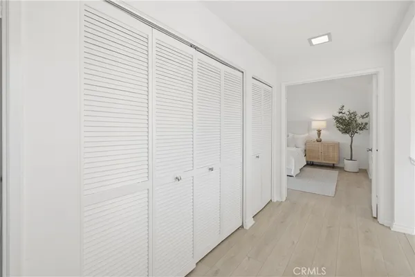 a view of a room with a wardrobe space