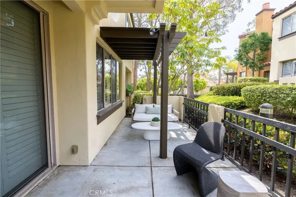 a view of balcony with furniture