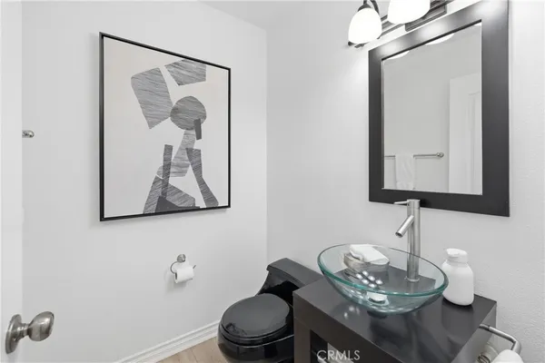 a bathroom with a toilet and a sink